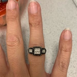 Black and white diamond right hand ring